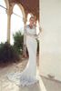 2015 Sheer Lace Wedding Dresses Long Sleeve V Neck Cutouts Sheath Court Train Sexy Backless Vintage Bridal Gowns Riki Dalal6892405