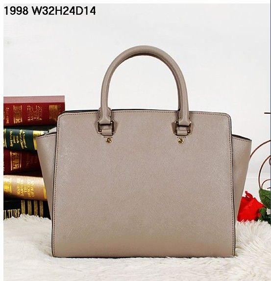 Designer leather handbags genuine cow leather popular Metal Rivets decorative fashion bags fast 