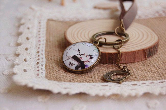 Novel Audrey Hepburn Keychain Cameo Clock Key Chain Vintage Leather Key Chain Handgjorda smycken K0011911048