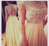 Wholesale 2021 Elegant Floor Length Pageant gowns Evening Gown Sequins Beaded Cap Sleeve Champagne Chiffon Prom Dresses
