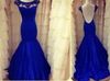 2016 sexy backless avondjurken cap mouwen royal blauw mermaid pure nek kralen Zie door formele kleding prom optochtjurken 1856000