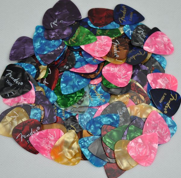 

Lots of 100 pcs Thin 0.46mm Printed guitar picks Plectrums Celluloid Assorted Colors