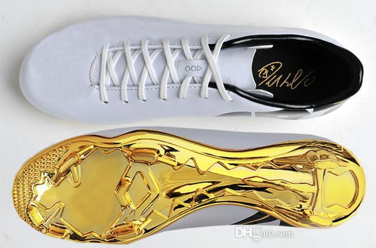 white cleats with gold bottom