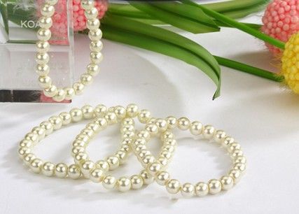 Braccialetti nuziali elastici della nuova del lotto bianco beige della perla dei braccialetti della perla