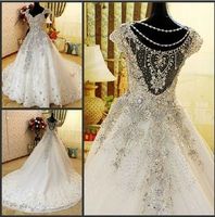 Luksusowy Bling Bling Sukienka ślubna Dubai Czapki Rękawy A-Line Sheer Powrót Kryształ Dżetów Apliqued Exquisite Suknie ślubne Wykonane