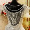 Lyxig Bling Bling Wedding Dress Dubai Cap Sleeves A-Line Sheer Back Crystal Rhinestones Appliqued Exquisite Bridal Gowns Custom Made