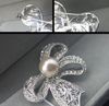 1.8 Inch Rhodium Silver Plated Clear Rhinestone Diamante Wedding Bow Brooch with Ivory Pearl