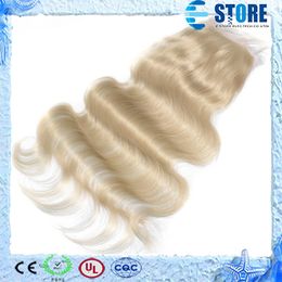 #613 bleached knots 4*4inches size free style 6a unprocessed brazilian virgin remy hair blonde Colour lace closure body wave weave,M