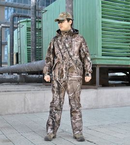 Gratis frakt 1 kostym original Remington Realtree Ap Camo Jakt Kläder Kamouflage Jaktjacka + Bibs, Camo Jakt kostym Fiske kläder