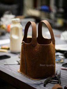 Todo el bolso de mano hecho a mano, bolso de cubo de diseñador de marca, bolso de mujer de moda simple, usando el bolso de compras original de cuero TC de gran capacidad