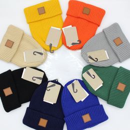 All-match rayé cuir étiquette outillage laine chapeau hommes et femmes à la mode marque tricot chapeau automne et hiver chaud ski chapeau pull chapeau