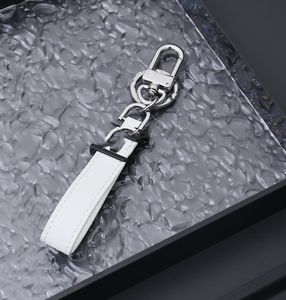 Porte-clés de voiture en alliage de Zinc et cuir, fermoir Vachette, créatif et Simple, pendentif, ornement de voiture, en Stock, vente en gros