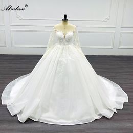 Alonlivn Chic Illusion col en V manches longues robe de mariée robe de mariée perles paillettes dentelle brillante tribunal train robes de mariée peuvent être personnalisées