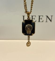 AM nouveau collier ancien visage doré en laiton cristal noir avec crâne orné d'un style punk élégant5609480