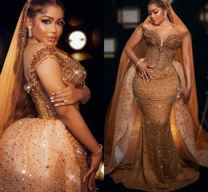 Amazing Gold African Girls Trompeta Vestidos de baile con perlas de tren desmontables Con cuentas Sheer Neck Pageant Vestidos de noche Cap Sleeves Plus Size Vestidos De Festa CL2252