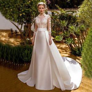 Verbazingwekkende overskirt kanten trouwjurken v nek bruidsjurken met afneembare trein lange mouwen geapplique a line satin vestido de novia 415