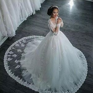 Incroyable robes de mariée à col transparent en dentelle appliques perles illusion manches longues robes de mariée robe de bal balayage train robes de mariée modernes
