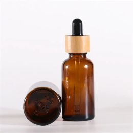 Flacon compte-gouttes en verre ambré avec couvercles en bambou bouteilles d'huiles essentielles flacons d'échantillons pour parfums cosmétiques liquides en gros