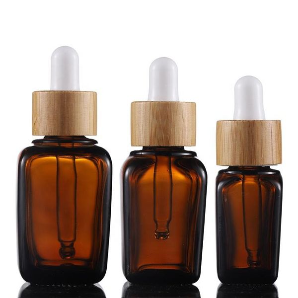 Bouteilles de parfum d'huile essentielle en verre ambré 10 ml 20 ml 30 ml 50 ml 100 ml E bouteille de pipette liquide avec couvercles en bambou de la vente d'usine