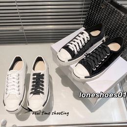 Amerikaanse gloednieuwe designer boardschoenen vrouwelijke co-branded limited edition canvas schoenen luxe pluche platte schoenen Panda zwart-witte schoenveter loopschoenen lage hulp