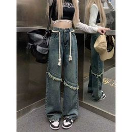 Pantalon en jean ébouriffé de style américain pour les femmes au printemps et en été.Instagram High Street Ligne droite minceur et jambe lâche large Pantalon Pantalon de la jambe