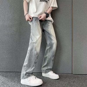 Pantalon d'ambiance de style américain avec sens de conception Instagram à la mode de rue High Street, jean lavé, printemps masculin et nouveau pantalon à jambe droite slim fit