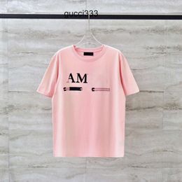 amirirlies Chemises d'été roses amari Splash Hommes amirl Hommes T amis Designer Vêtements AM personnalité lettre amar encre TShirt miri Manches courtes 2023 Tops d'été T Shi