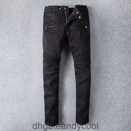 Amirres hommes haute Denim Jeans Designer Pantalons jeans Homme noir déchiré marque de mode de rue minceur étoile polyvalente même style de moto pieds élastiques JVLL