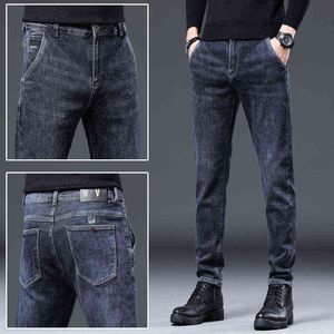 en herfst winter 2022 high-end blauwe jeans heren Koreaanse mode slank fit veelzijdige elastische lange broek