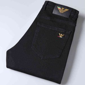 en herfst winter heren jeans jeugd Koreaanse versie slanke fit elastische kleine voeten katoen zwarte broek