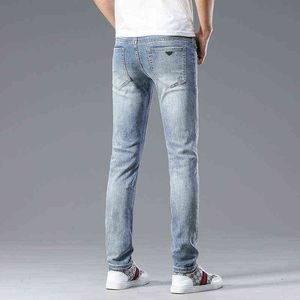 en lente zomer dunne high-end jonge heren mode puur katoen slank fit casual Koreaanse veelzijdige elastische denim broek