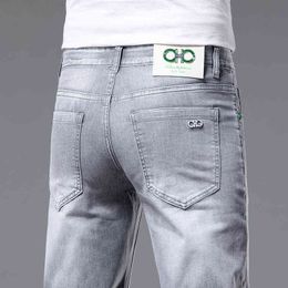 und Frühling Sommer Trend Jeans Herren Slim Fit elastische koreanische kleine Fuß lange Hosen Marke
