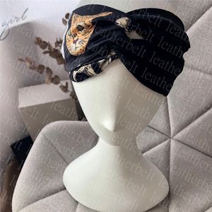 Diadema con patrón de animales, banda para el pelo cruzada de satén de seda, tocado negro de empalme Irregular, aro de pelo de personalidad a la moda para mujer