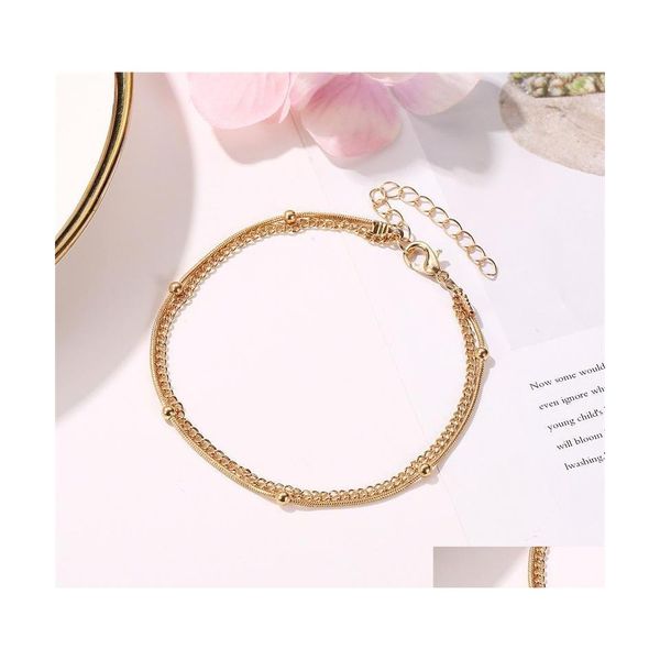 Bracelets de cheville 20 Pcs / Lot Double Couche Or Mode Européenne Été Pied Bijoux Pour Femmes Perles De Plage Ornements Géométriques 513 T2 Drop Delive Dhmzg