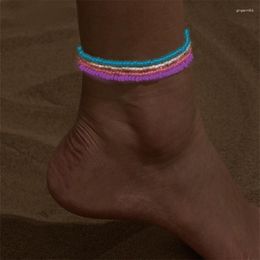 Bracelets de cheville 4 pièces/ensemble bohème lumineux perles colorées pour les femmes lueur perle été plage à la main cheville Bracelet pied jambe chaîne