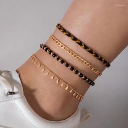 Bracelets de cheville HuaTang Style bohème tissé quatre pièces chaîne de cheville ensemble avec des glands perle contrastée en or noir