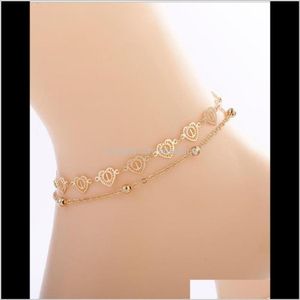 Anklets sieraden drop levering 2021 sets 3D en holle-out harten gecontacteerd kraal goud kleur vergulde metaalketen vrouwen voet anklet cadeau vbwnz