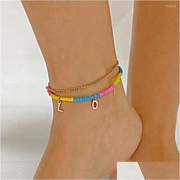 Bracelets de cheville JHSL femmes à la mode en couches perlées avec lettre charme couleur or en acier inoxydable bijoux de mode pied cheville bracelets goutte livraison Dhxa4