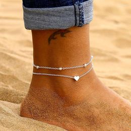 Bracelets de cheville VAGZEB femme Simple couleur argent coeur pieds nus Crochet sandales pied bijoux deux couches Bracelet pour les femmes