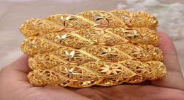 Annayoyo 4pcslot Ethiopian África Gold Color Bangles for Women Flower Bracelet Joyería de boda africana Medio Oriente18351042