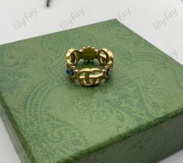 Antique Gold Designer G Ring Extravagant Blue Stone Lettre anneaux Femmes Femmes Men de mariage Bijoux Lady Party Cadeaux 6 7 84053489