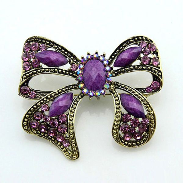 Antique Gold Purple Resin Rhinestone Bowknot Broche Pins Aleación de la vendimia Gran Broche para Mujeres Boda Novia Broches Joyería de la Venta Caliente