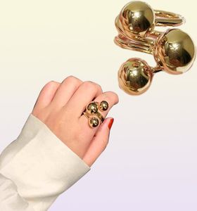 AOMU 2020 overdrijving gouden kleur metalen bal open ringen eenvoudige ontwerp geometrische onregelmatige vingerringen voor vrouwen feestjuwelen Q078382330