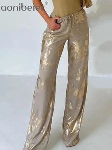 Aonibeier Gold Metallic Gedrukte vrouwen brede broek Traf 2024 Spring Elastic Mid Rise Side Side Party Pant vrouwelijke broek Y2K 231222