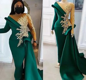 Arabic Aso Ebi Dark Green Mermaid Prom Dresses Gold Appliqued Lace Beaded Sheer Neck Long Sleeves Evening Gowns Peplum Side Train Satin Women Formal Wear