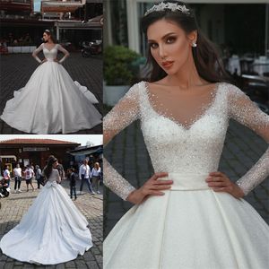 Arabische luxe trouwjurken een lijn juweel nek kralen lovertjes bescheiden trouwjurk op maat gemaakte sweep trein lange mouw vestidos de novia