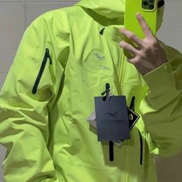 Arc Veste Designer Top Fluorescent Vert Hommes Sports de Plein Air Imperméable Coupe-Vent Coupe-Vent Séchage Rapide Chaud Manteau Casual Couple À Capuche