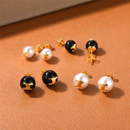 Série Arch Série tridimensionnelle Relief Black Agate Pearl Earrings Niche Design Sense Temperament Versatiles Oread Boucles d'oreilles