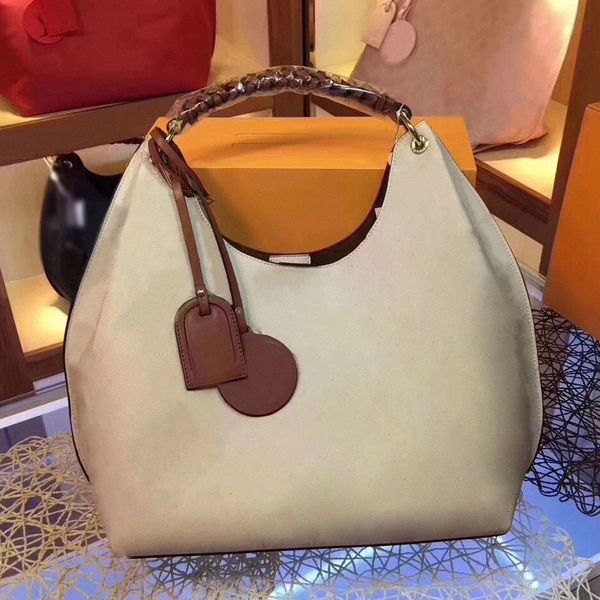 Carmel Hobo Bag Mahina Poignée en cuir Sac à main spacieux Fourre-tout Amovible Charme Étiquette de nom Designer de luxe Sacs à bandoulièreOJYX #