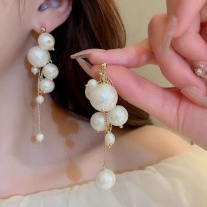 Boucles d'oreilles asymétriques à pampilles en perles pour femmes, nouvelles boucles d'oreilles de tempérament haut de gamme, Design de Niche, sens, 2023